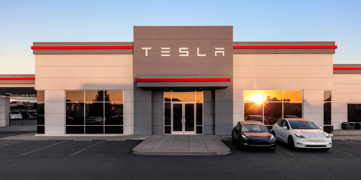 tesla laying off employees